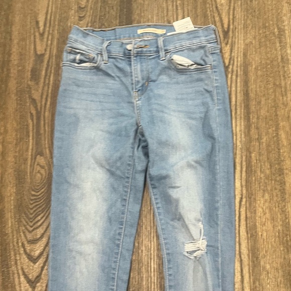 Levi's 710 Super Skinny Jeans Mid Rise Distressed Fray Hem Light Wash Size 27 - Picture 6 of 12